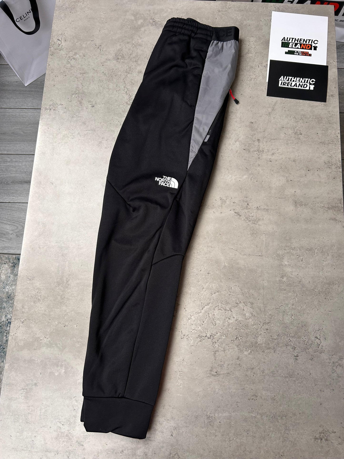 THE NORTH FACE MITTELEGI TRACKSUIT - BLACK/GREY/RED