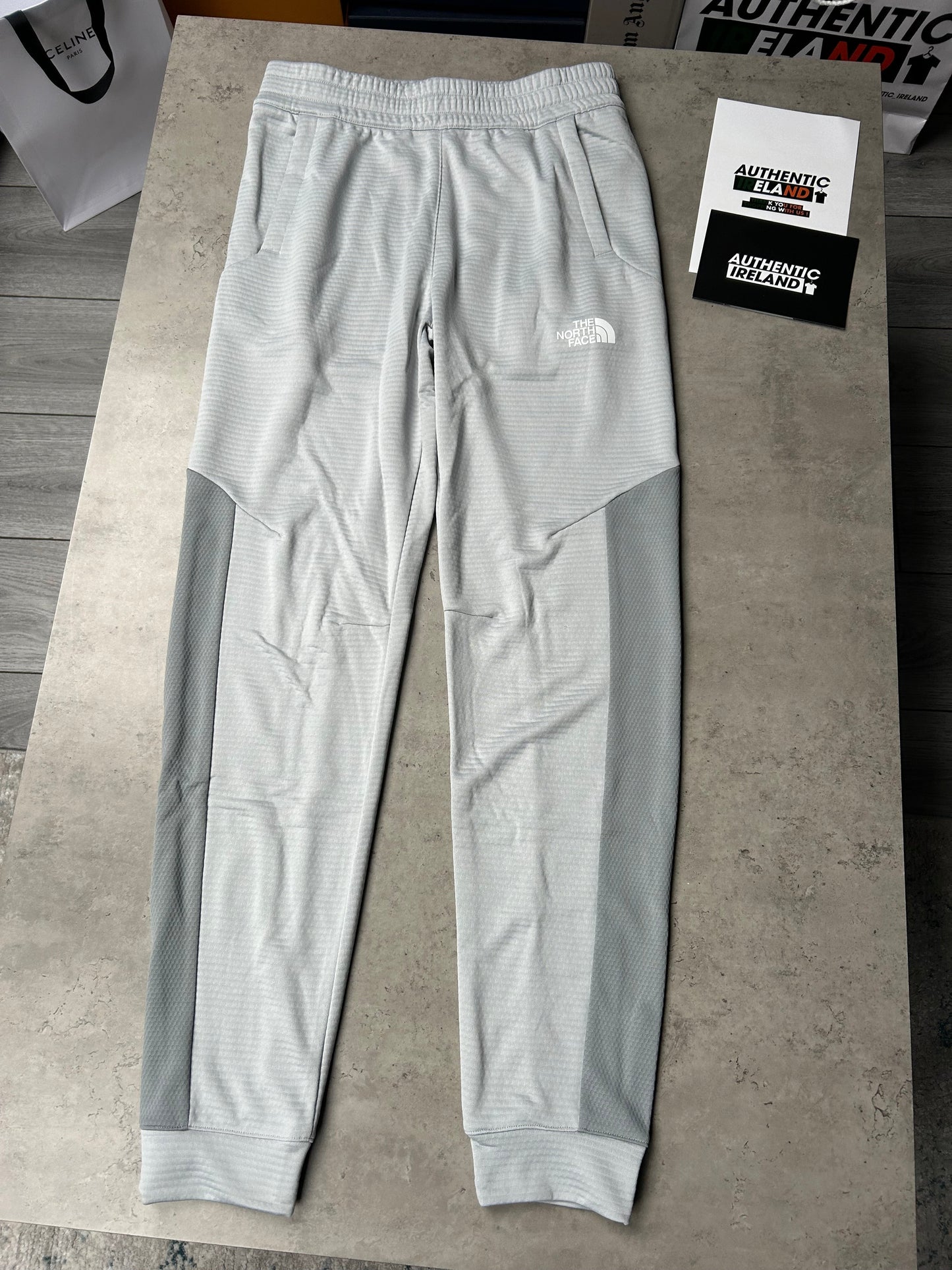 THE NORTH FACE MOUNTAIN ATHLETICS TRACKSUIT - LIGHT GREY/SLATE/GREY